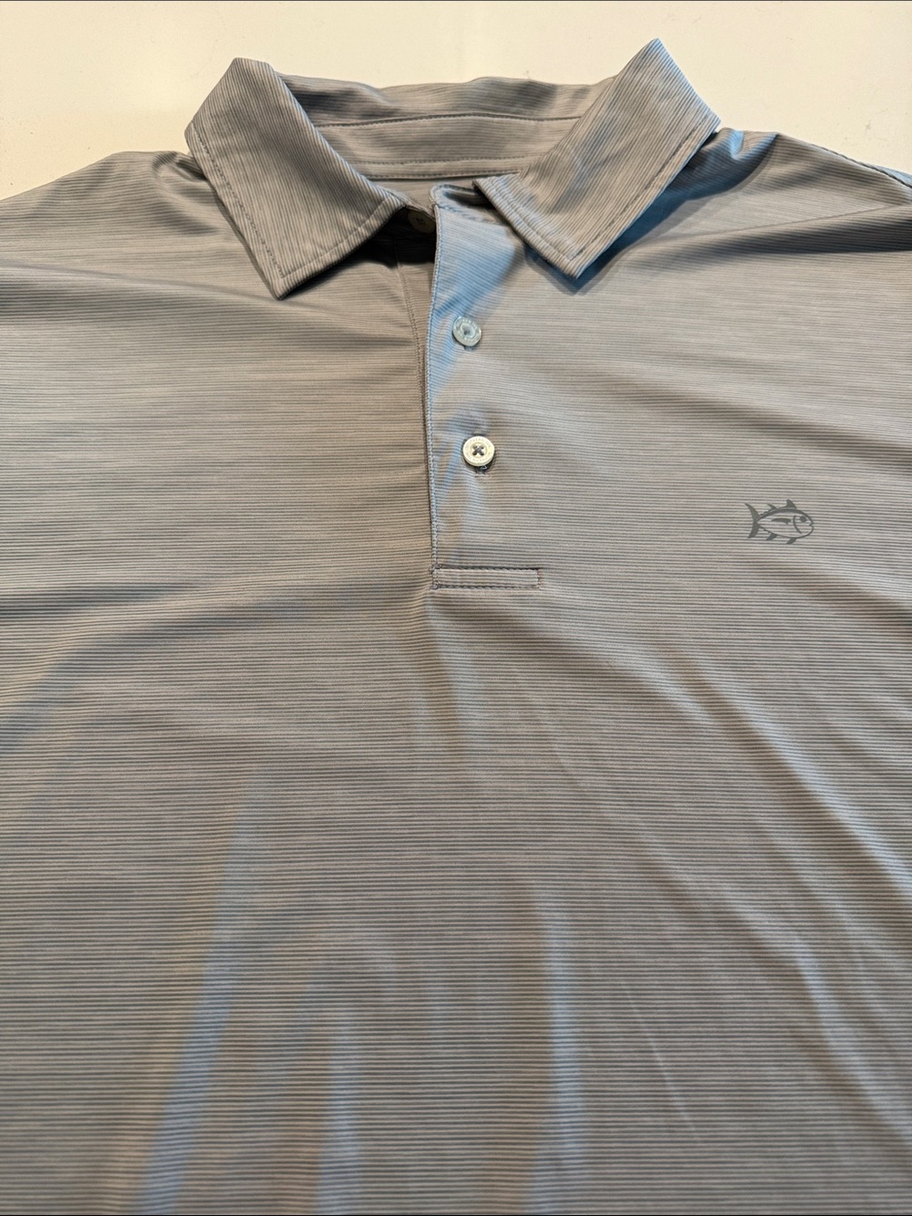 Southern Tide Men's Light Gray Performance Polo with Subtle Stripe.
